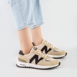 کفش و کتانی زنانه و دخترانه مدل نیوبالانس NEWBALANCE رنگ کرم مشکی کد M673